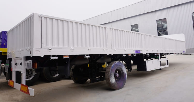 60 Ton Flatbed Trailer with sideboard for Sale | What is a Trailer with Sides Board called?
